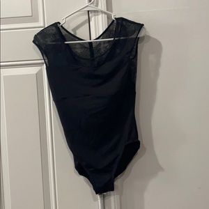 Black dance leotard with lace and ribbon back.